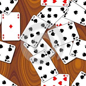 Playing cards scattered on the wooden table - seamless pattern texture background