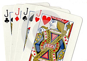 Playing cards showing a hand of four jacks.