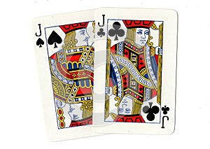 Playing cards showing a pair of black jacks.