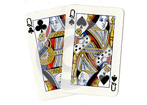 Playing cards showing a pair of black queens.