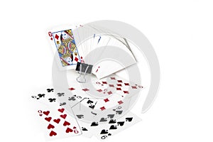 Playing cards spreaded on the white background.
