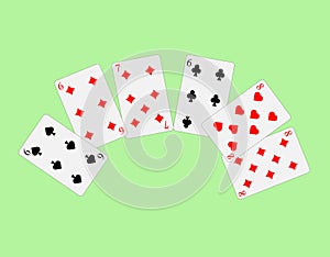 Playing cards. Vector image on a green background