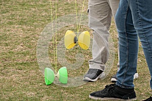 Playing with Chinese Yo Yo's in the Park