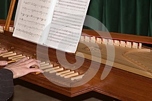 Playing the clavecin