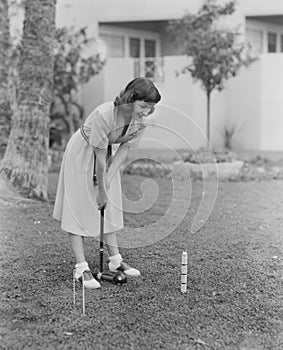 Playing croquet