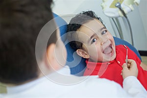 Playing dentist in the dental office.