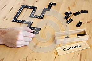 Playing domino game