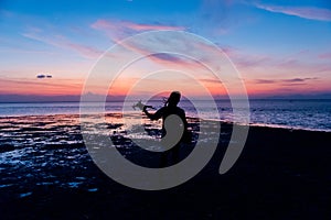 Playing drone during sunset at Lakawon Beach Resort, Cadiz, Negros Occidental, Phlippines photo