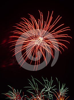 Playing with fireworks in the night sky