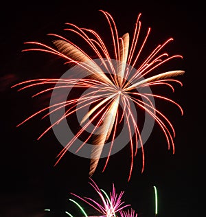 Playing with fireworks in the night sky