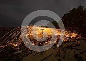 Playing with flames Holding a fire to cause flakes