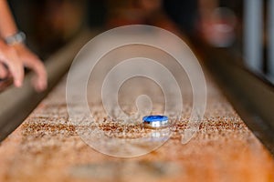 Playing a game of shuffleboard..