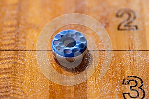 Playing a game of shuffleboard..