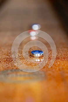 Playing a game of shuffleboard..