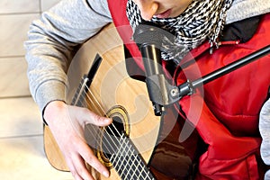 Playing guitar and singing