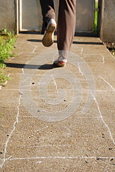 Playing hopscotch