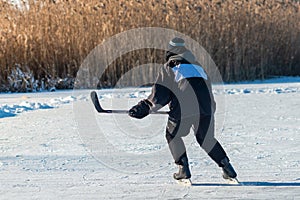 Playing ice street hockey on the frozen lake