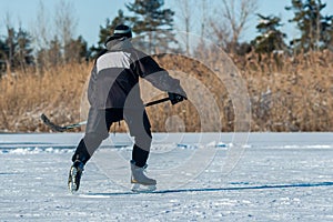 Playing ice street hockey on the frozen lake