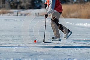 Playing ice street hockey on the frozen lake