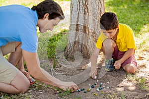 Playing marbles with my dad