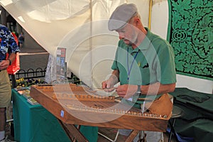 USA, AZ: Playing an Old-time Hammered Dulcimer