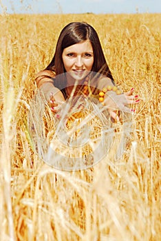 Playing on plant of wheat