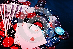 Playing poker chips, cards and money close -up. the view from the top