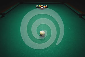Playing pool in a night pub