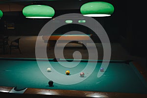 Playing pool in a night pub