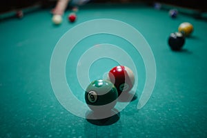 Playing pool in a night pub