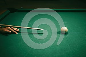 Playing pool in a night pub