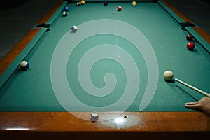 Playing pool in a night pub