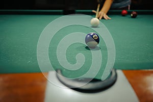 Playing pool in a night pub