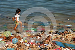 Playing among rubbish