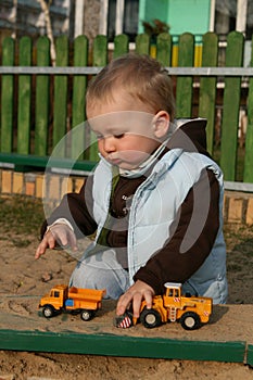 Playing in the sandpit photo
