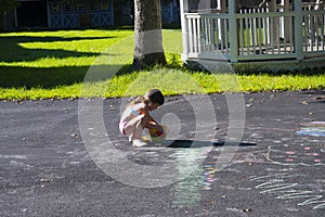 Playing with sidewalk chalk