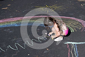 Playing with sidewalk chalk