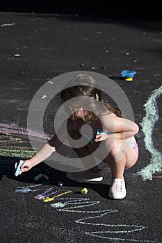 Playing with sidewalk chalk