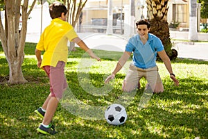 Playing soccer with my dad