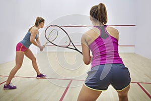 Playing squash with friends