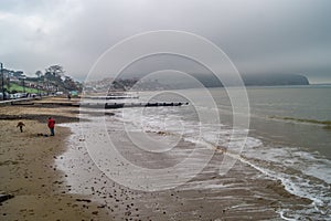 Playing on a Swanage winter beach