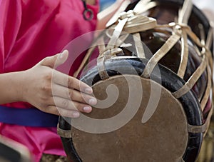 Playing the Thai drum
