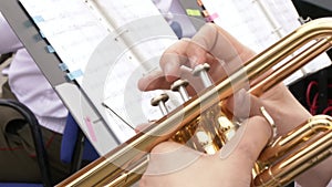 Playing the trumpet, close-up