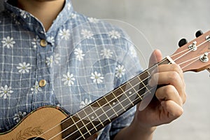 Playing ukulele