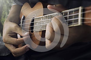 Playing Ukulele photo