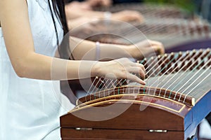 Playing Zither photo