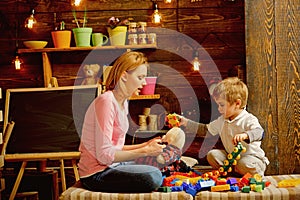 Playschool concept. Playschool kid play with mother. Playschool activities. Playschool education and child care