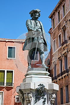 Playwright Carlo Goldoni statue with pedestal in Venice photo