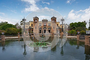 Plaza de America Central Pond and Mudejar Pavilion at Maria Luisa Park - Seville, Andalusia, Spain photo