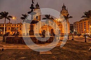 Plaza de Armas - with the Basilica Cathedral and the fountain in Lima, the capital of peru, at night